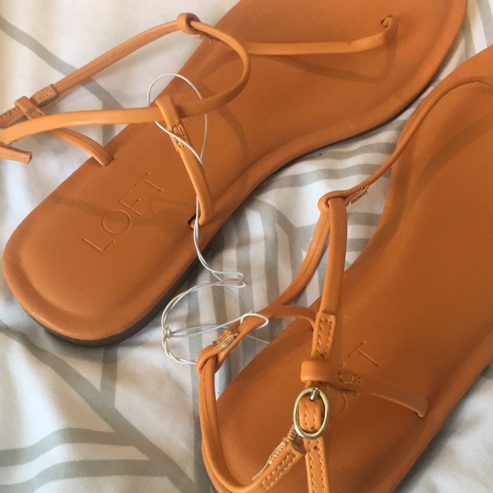 Orange sandals.